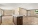 Open living space with island features new floors, neutral colors and great natural light at 143 Lakewind Dr, Mooresville, NC 28115