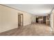 Spacious open floor plan connects kitchen and living room in a bright, modern home at 143 Lakewind Dr, Mooresville, NC 28115