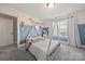 Playful bedroom featuring a tent-like frame bed, neutral walls, and bright window at 1736 Townsend Ln, Rock Hill, SC 29730