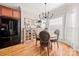 Elegant dining room featuring hardwood floors, natural light, and stylish chandelier at 1736 Townsend Ln, Rock Hill, SC 29730