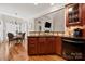 Charming kitchen showcasing cherry cabinets and views to dining room at 1736 Townsend Ln, Rock Hill, SC 29730