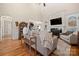 Inviting living room featuring hardwood floors, fireplace, and soaring vaulted ceilings at 1736 Townsend Ln, Rock Hill, SC 29730