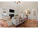 Spacious living room showcasing a cozy fireplace, hardwood floors, and a neutral color palette at 1736 Townsend Ln, Rock Hill, SC 29730