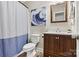 This is a bathroom with a shower, vanity, toilet, and modern design at 301 N 4Th Ave, Maiden, NC 28650