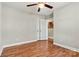 Bright bedroom featuring vinyl floors, ceiling fan and a large window, creating a comfortable space at 301 N 4Th Ave, Maiden, NC 28650