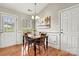 Cozy dining area featuring a wooden table, chairs, and natural light, with neutral wall paint at 301 N 4Th Ave, Maiden, NC 28650