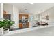 Well-lit kitchen with stainless steel appliances, wooden cabinets, and an adjacent dining area with natural light at 301 N 4Th Ave, Maiden, NC 28650