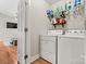 Convenient laundry room equipped with modern appliances and ample storage, making laundry chores a breeze at 301 N 4Th Ave, Maiden, NC 28650