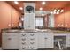 Elegant bathroom featuring double vanity with granite countertops, ample storage, and a well-lit makeup area, a perfect blend of luxury at 810 Lake Wright Rd, China Grove, NC 28023