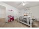 Bright bedroom features a bed with ample space and closet at 9706 Tea Garden Dr, Gastonia, NC 28056