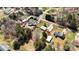 Aerial view of a property with a large lot, small outbuildings and mature trees at 111 Cedar Dr, Salisbury, NC 28147