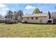 Expansive backyard featuring a above-ground pool, storage shed, and manicured lawn, perfect for outdoor activities at 111 Cedar Dr, Salisbury, NC 28147