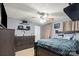 Gray bedroom featuring ceiling fan, bed with gray bedding, and dresser at 111 Cedar Dr, Salisbury, NC 28147