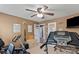 Bedroom featuring exercise equipment, TV, and neutral walls at 111 Cedar Dr, Salisbury, NC 28147