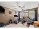 Spacious bedroom with neutral walls, a ceiling fan, and exercise equipment for a home gym at 111 Cedar Dr, Salisbury, NC 28147