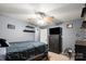 Bedroom featuring ceiling fan, bed with gray bedding, and dresser at 111 Cedar Dr, Salisbury, NC 28147