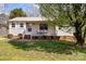 Cozy single-story home featuring a charming front porch and a well-kept lawn at 111 Cedar Dr, Salisbury, NC 28147