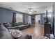 Comfortable living room featuring a plush sectional sofa and modern flooring at 111 Cedar Dr, Salisbury, NC 28147