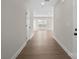 Hallway with wood-look flooring looking into the other rooms at 113 Homewood Ln, Statesville, NC 28625