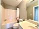 Small, tidy bathroom featuring a tub and shower combination, with a single vanity at 12217 Greymore Ct, Charlotte, NC 28277