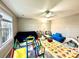 Bright playroom featuring large windows, a comfortable sofa, and plenty of space for play, encouraging active fun at 12217 Greymore Ct, Charlotte, NC 28277