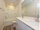 Bright bathroom with double sinks, quartz countertop, and a tub-shower combo at 1241 Morehead Dr, Salisbury, NC 28144