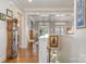 Welcoming foyer with hardwood floors, neutral tones, and elegant furnishings, showcasing a spacious interior at 126 Sisters Cove Ct, Mooresville, NC 28117