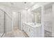 This bathroom offers double sinks, a large mirror, and a stand up shower at 138 Satchel Ct, Mooresville, NC 28115