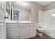 Bathroom with white cabinets, shower, and toilet at 16729 Timber Crossing Rd, Charlotte, NC 28213