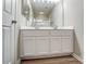 Stylish bathroom featuring dual sinks, contemporary cabinets, and modern finishes for a spa-like feel at 16729 Timber Crossing Rd, Charlotte, NC 28213