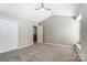 Bedroom featuring neutral walls, carpet, closet, and natural light at 16729 Timber Crossing Rd, Charlotte, NC 28213