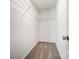 Walk-in closet with carpeted floor and wire shelving at 16729 Timber Crossing Rd, Charlotte, NC 28213