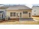 Home exterior features patio, siding, and windows at 16729 Timber Crossing Rd, Charlotte, NC 28213