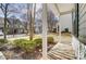 View from the front porch of the front yard, street, and other homes at 16729 Timber Crossing Rd, Charlotte, NC 28213