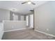 Bright hallway with neutral walls and carpet at 16729 Timber Crossing Rd, Charlotte, NC 28213