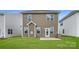 This new construction home features a large backyard space perfect for entertainment and relaxation at 1816 Otter Perch Ln, Fort Mill, SC 29715