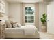 Cozy bedroom features a comfortable bed, neutral decor, and a bright window with pleasant outdoor views at 1816 Otter Perch Ln, Fort Mill, SC 29715
