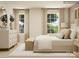 Bright bedroom with hardwood floors features a plush bed, accent furniture, and lots of natural light at 1816 Otter Perch Ln, Fort Mill, SC 29715