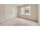 Neutral bedroom with carpet, a window and a closet at 1816 Otter Perch Ln, Fort Mill, SC 29715