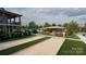 Exterior shot of residents playing bocce ball next to a covered gazebo at 1816 Otter Perch Ln, Fort Mill, SC 29715