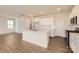 Modern kitchen with white cabinetry, stainless steel appliances, and a large center island at 1816 Otter Perch Ln, Fort Mill, SC 29715