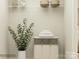 Well-organized laundry area features storage shelves, a clothes hamper, and a decorative plant at 1816 Otter Perch Ln, Fort Mill, SC 29715