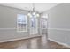 Dining area with hardwood floors and a walk-out to the backyard at 1911 Kingstree Dr, Monroe, NC 28112