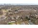 Aerial view of brick building featuring large windows, set against skyline and mature trees at 201 Hoskins S Rd # 124, Charlotte, NC 28208