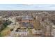 Aerial view of a large brick building with ample parking and surrounding greenery at 201 Hoskins S Rd # 124, Charlotte, NC 28208