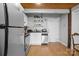 Modern kitchen with stainless steel appliances and a view of exterior door at 201 Hoskins S Rd # 124, Charlotte, NC 28208