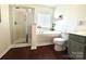 Well-lit bathroom featuring a soaking tub, glass-enclosed shower, and modern fixtures at 269 Loch Stone St, Fort Mill, SC 29715