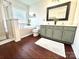 Bright bathroom featuring a soaking tub, separate shower, double vanity, and hexagon tiled window at 269 Loch Stone St, Fort Mill, SC 29715