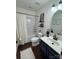 Neat bathroom with a combined tub and shower, sleek vanity, and modern fixtures at 269 Loch Stone St, Fort Mill, SC 29715