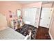 Bright bedroom with decorative rug, white shelving, and ample closet space at 269 Loch Stone St, Fort Mill, SC 29715